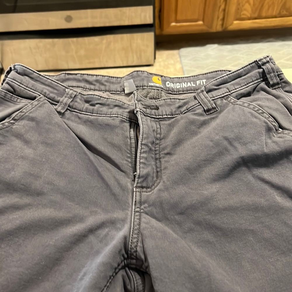 Womens carhartt fleece lined pants. Excellent condition. Never worn.